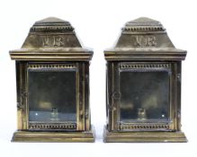 A pair of brass exterior door lamps with VR monogram, each of stepped rectangular form,