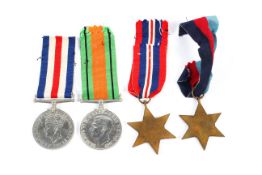 A collection of four World War II medals.