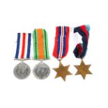 A collection of four World War II medals.