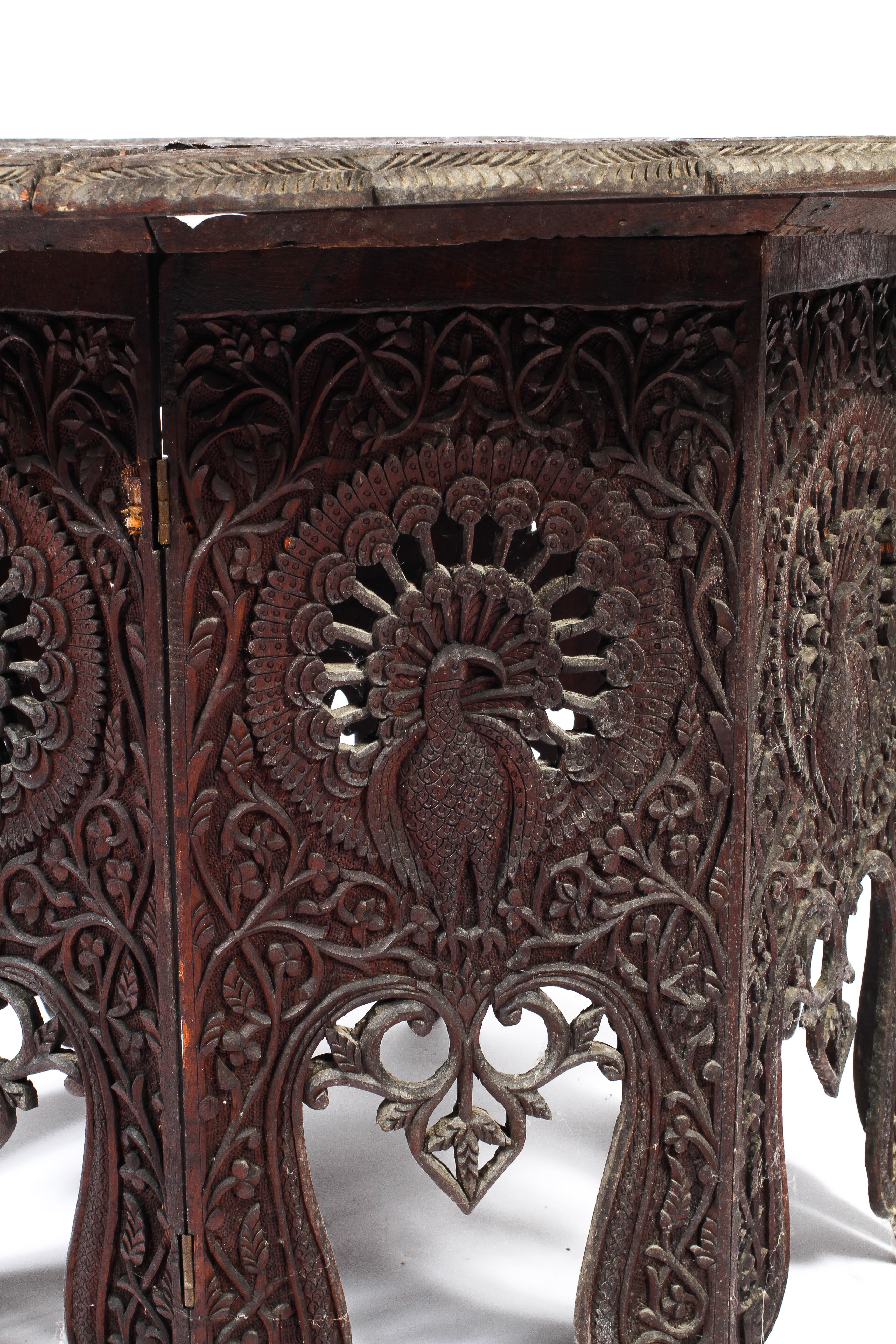 An Indian carved hardwood folding tray table, - Image 3 of 4