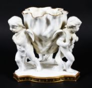 A Moore Bros porcelain putti centrepiece, circa 1880, impressed Moore,