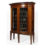 An Edwardian mahogany glazed marquetry display cabinet, of canted form,