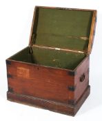 An early Victorian domed top iron-bound trunk on plinth base, with carry handles,