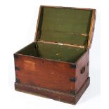 An early Victorian domed top iron-bound trunk on plinth base, with carry handles,