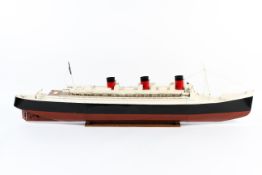 A large scale metal scratch built model of 'RMS The Queen Mary' Cunard,