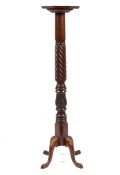 A Victorian turned mahogany torchere stand,
