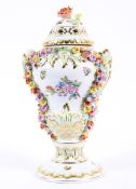 A Herrend flower-encrusted baluster pot-pourri vase and cover, 20th century,