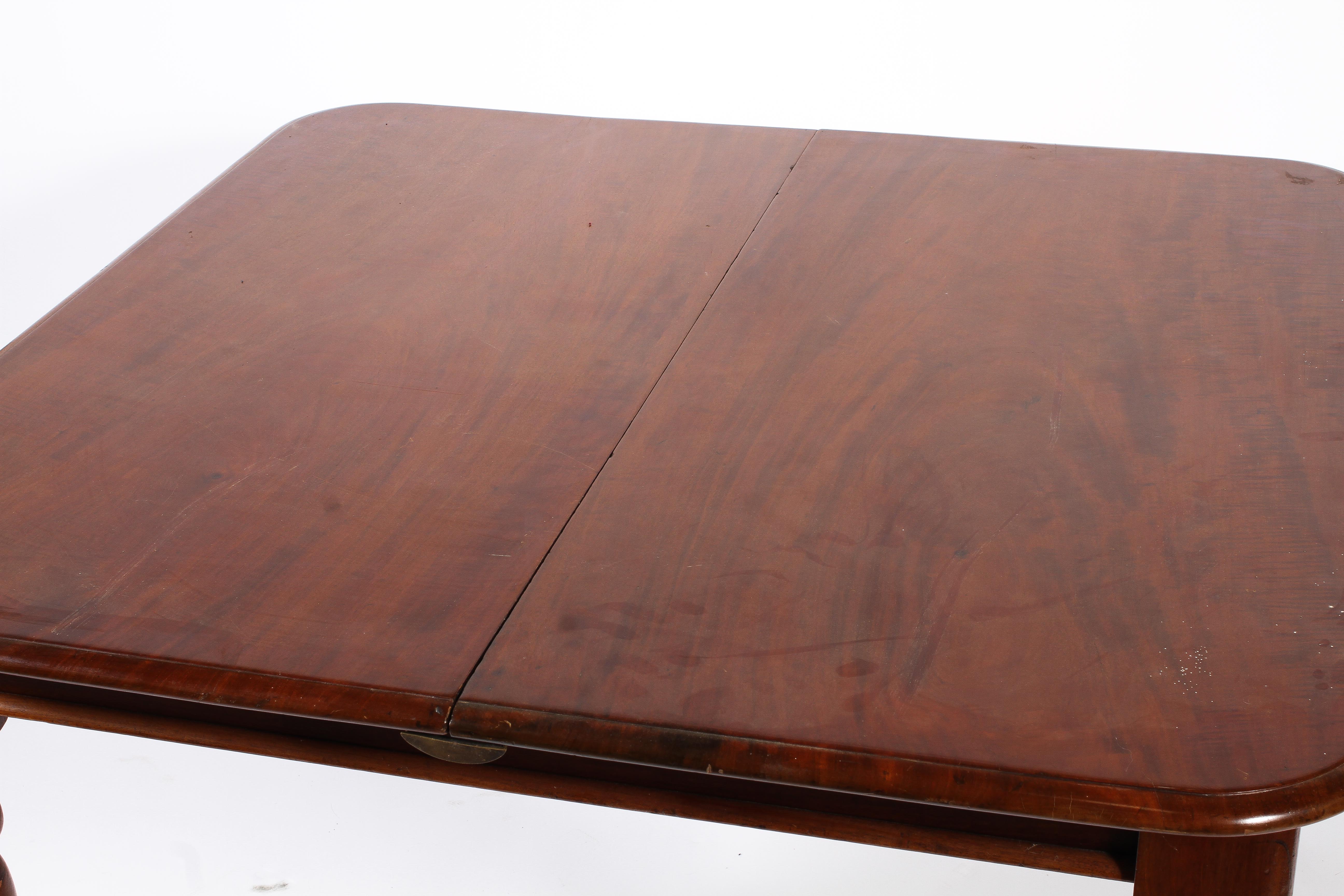 A Victorian mahogany extending dining table, with one additonal leaf, - Image 2 of 3