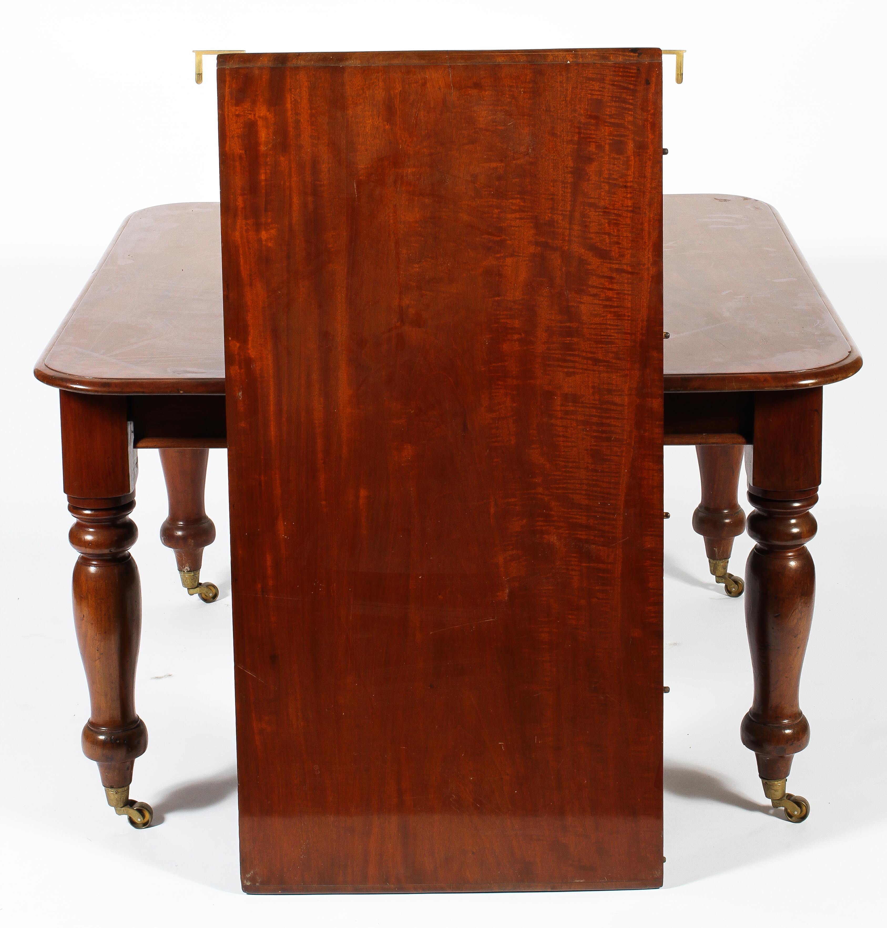 A Victorian mahogany extending dining table, with one additonal leaf, - Image 3 of 3