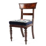 William IV mahogany desk chair, with bar shaped top rail and foliate carved uprights,