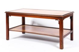 A Georgian style mahogany rectangular coffee table inset with tooled tan leather top, 20th century,