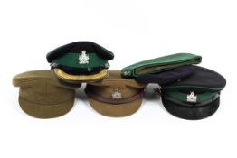 A collection of military hats,