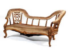 A Victorian walnut framed double ended chaise longue,