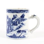 A Chinese Export blue and white mug, late 18th century, with a dragon moulded handle,