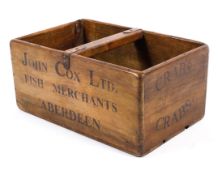 A wooden carry box with black stamped lettering for John Cox Fish merchant Aberdeen, crabs,