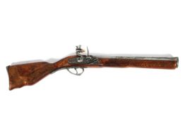 A reproduction decorative blunderbuss, with wooden stock and decorative metal barrel and mechanism,