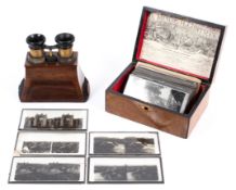 A Victorian wood and brass mounted stereoscopic viewer with a collection of photographs