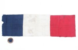 An 1830 French Revolution flag and cockade, both tricolour and hand sewn,