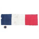 An 1830 French Revolution flag and cockade, both tricolour and hand sewn,