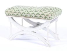 A Regency style white wooden X-frame stool,