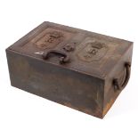 A cast metal lock box with arrow stamp to front, lock mechanism present,