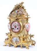 A late 19th century French porcelain and gilt-metal mounted mantle clock,