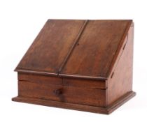 A Victorian oak stationary box, of traditional sloping form,