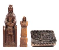 Two carved wooden religious figures and a carved woodblock,