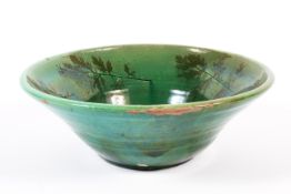 A Fremington style green glazed pottery bowl, late 19th/early 20th century,
