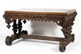 A Victorian carved oak dining table,