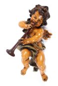 A 20th century painted model of a putto, possibly from a fair ground carousel.