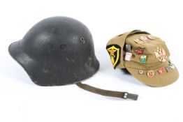 A German/Axis World War II style 'Stahlhelm' helmet,