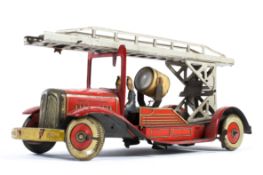An early 20th century clockwork Mettoy tin-plate fire engine,