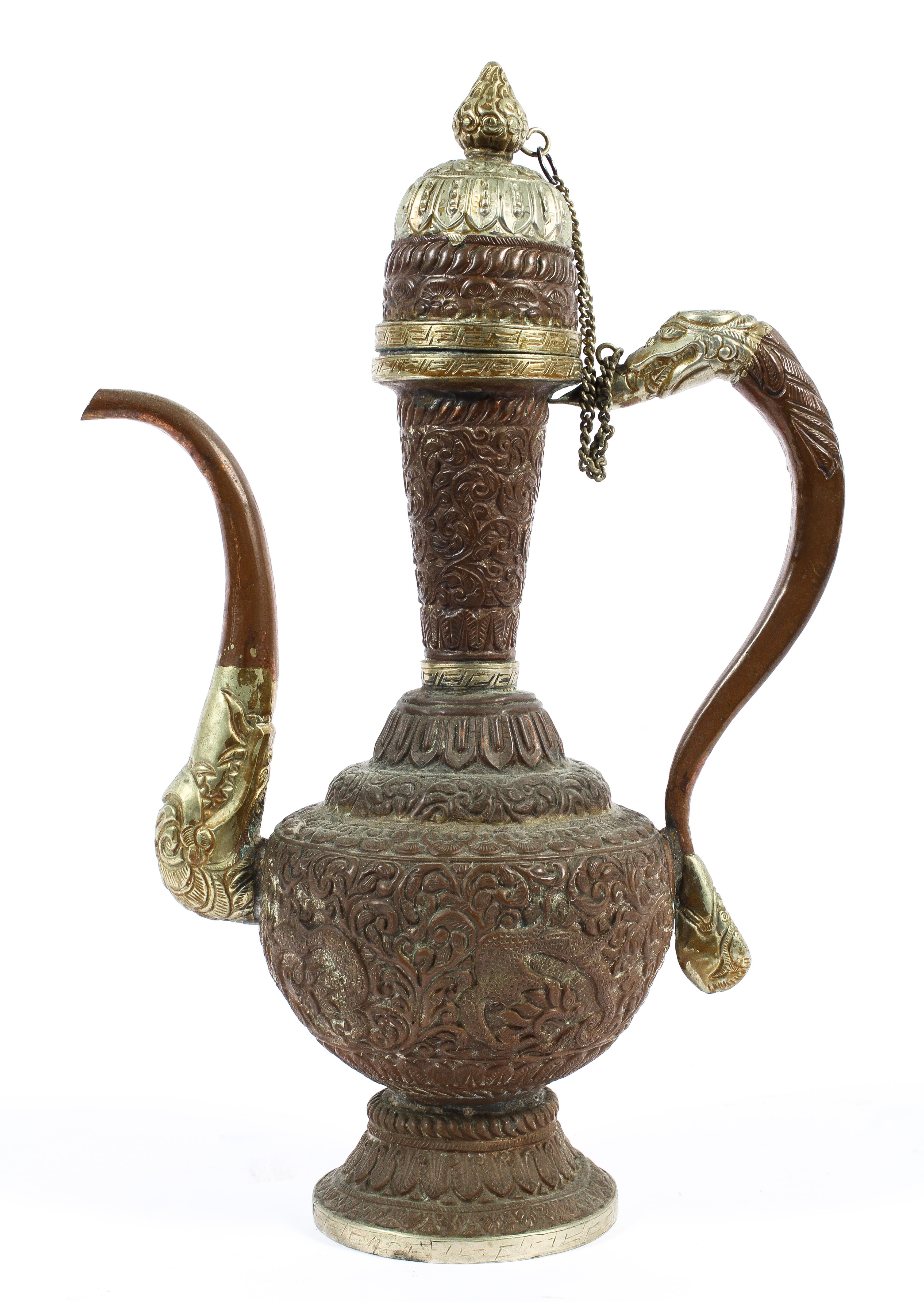 A mixed metal Turkish style coffee pot with cast and chased decoration,