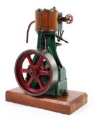 A Stuart Turner castings single cylinder model steam plant, on wooden plinth base,