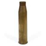 A large brass tank artillery shell