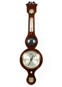 A Victorian mahogany banjo shaped barometer, with silvered dials,