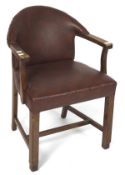 An early 20th century mahogany framed carver armchair, having leather studded back and seat,