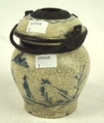 A Chinese brush pot, depicting a blue landscape scene with a crackle glaze,