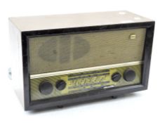 A vintage PAM radio, in stained wooden case, serial number 108571,