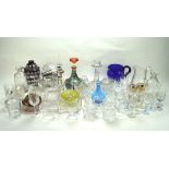 A large collection of assorted glassware, including jugs, paperweights, decanters, bowls and more,