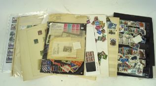 A selection of British stamps, of assorted ages and designs, including commemorative examples,