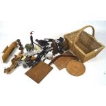 A collection of assorted tribal items, comprising mostly wooden items, including a carved elephant,