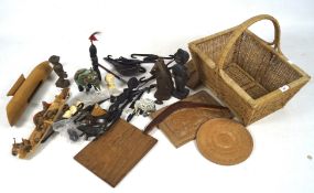 A collection of assorted tribal items, comprising mostly wooden items, including a carved elephant,