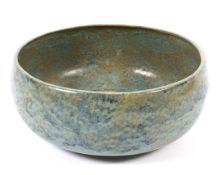 A studio pottery blue-green glazed bowl,