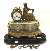 A French gilt brass and marble mantle clock, the white dial with Roman numerals,