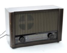 A vintage Baird radio, model 301, in a stained wood case,