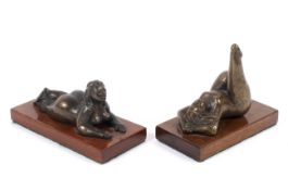 Two Jean Doyle bronze figures, depicting a 'Lady Lying' and a 'Reclining Nude',