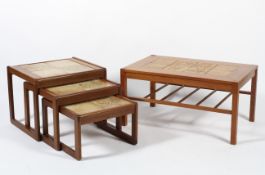 A retro teak tile top table with spindle gallery below together with a G Plan style tile top nest