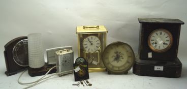 A collection of assorted clocks, to include a slate mantle clock,